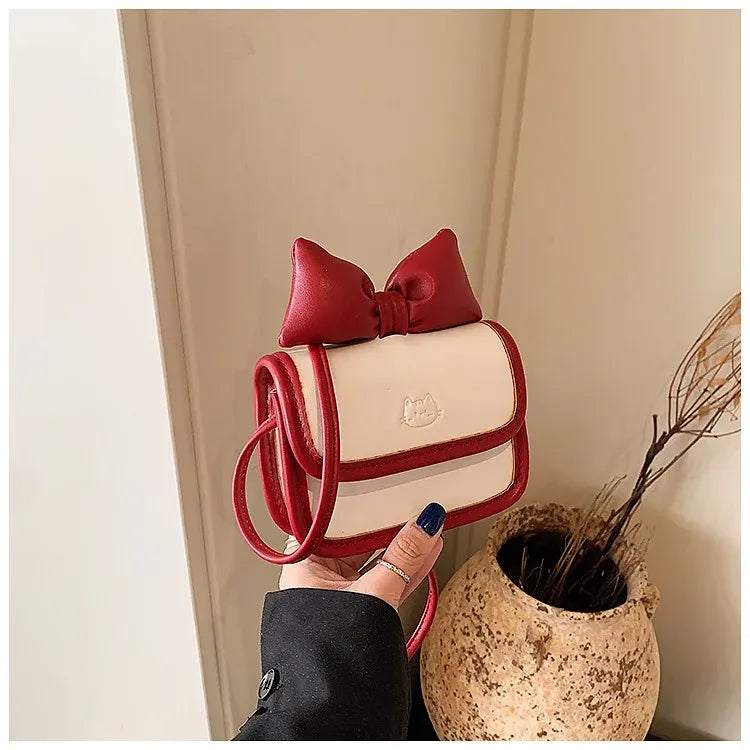 Bow-Tie Cat Emblem Leather Crossbody Bag